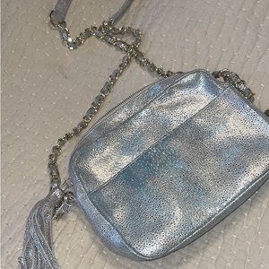 Kelly Wynn Silver Metallic Mingle Mama Crossbody  tassel